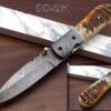 Damascus steel 7.7" long Folding Knife Ram horn with Damascus bolster scale, custom made 3.7" Hand Forged blade cow hide leather sheath