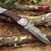 Damascus steel 9" long Folding Knife, Rose wood Scale with Engraved steel bolster, custom made 4" Hand Forged blade cow hide leather sheath