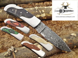 Damascus steel 6.5 " long Folding Knife, Various scales available with steel bolster, 3" Hand Forged blade, Cow hide leather sheath included