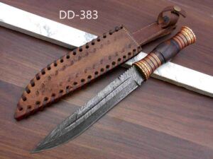 13" hand forged Damascus Hunting Knife, 7" blade, exotic Rose wood scale crafted with engraved brass work and fiber spacing, Leather sheath