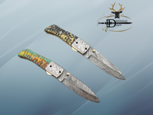 Damascus Steel Folding knife, Exotic Jigged scale in Camouflage & green combo, Engraved plant on steel bolster, Thumb knob & liner lock, Cow Leather sheath