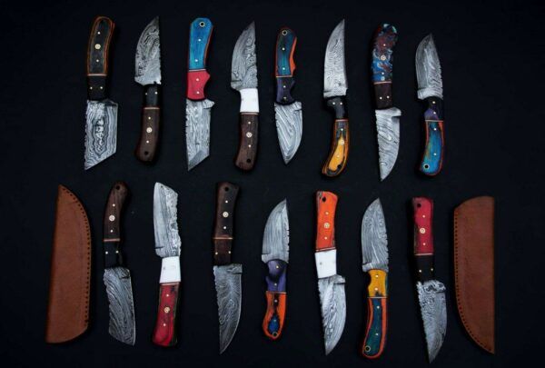 15 pieces Damascus steel fixed blade skinning knives lot with Leather sheath. Over 120 inches long Damascus steel knives in assorted colors