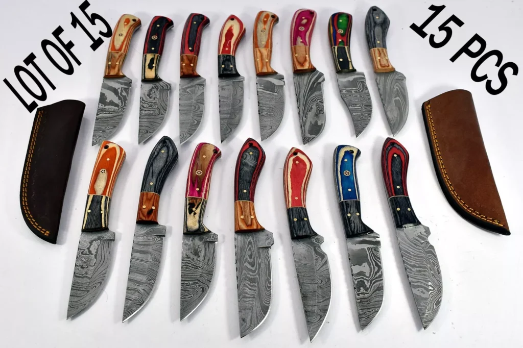 15 pieces Damascus steel Multi color wood scale skinning knives set with Leather sheath. Over 110 inches long Damascus steel blade knives